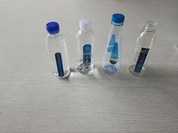 Plastaj Botelaj Etikedaj Maŝinoj por akvobotelaj etikedaj ekipaĵoj