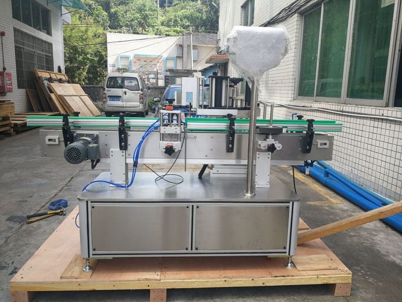 Ĉina Orientita Envolva Etikeda Sistemo Por Ronda Botelo / Ujo / Vazo-provizanto